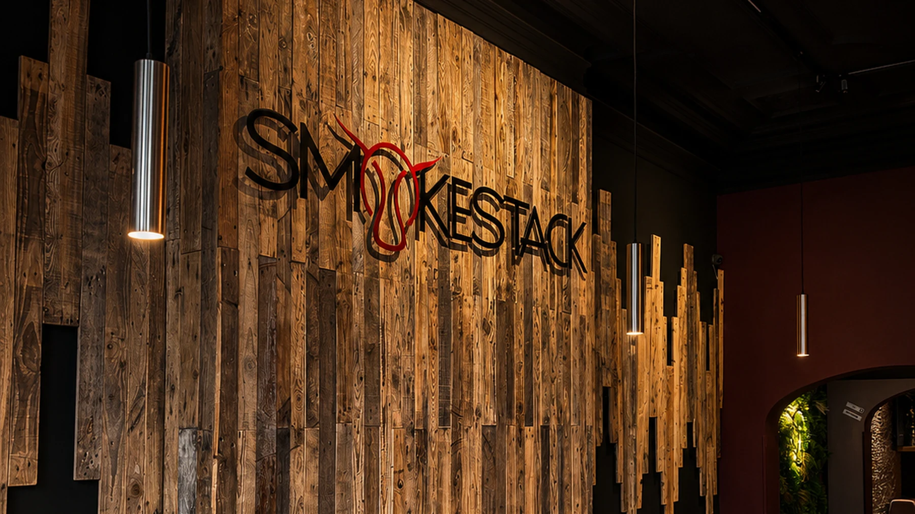 Smokestack Blackburn restaurant interior with illuminated branding